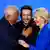 Ukraine Kyjiw 2026 | António Costa, Wolodymyr Selensky und Ursula von der Leyen umarmen sich und lachen (24.02.2026)