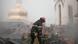 Ukrainian rescue workers on the smokey roof of Kyiv's Assumption Cathedral following a Russian drone strike Ukrainian rescue workers on the smokey roof of Kyiv's Assumption Cathedral following a Russian drone strike