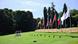 G7 sign on a plinth on a lawn, flags of G7 nations G7 sign on a plinth on a lawn, flags of G7 nations