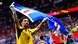Cape Verde goalkeeper, Vozinha, holds aloft his country's flag Cape Verde goalkeeper, Vozinha, holds aloft his country's flag