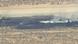 Smoke rises from a blackened part of Edwards Air Force Base after the crash of a U.S. Air Force B-52 bomber aircraft in Edwards, California, U.S., June 15, 2026, in a still image from news helicopter video Smoke rises from a blackened part of Edwards Air Force Base after the crash of a U.S. Air Force B-52 bomber aircraft in Edwards, California, U.S., June 15, 2026, in a still image from news helicopter video