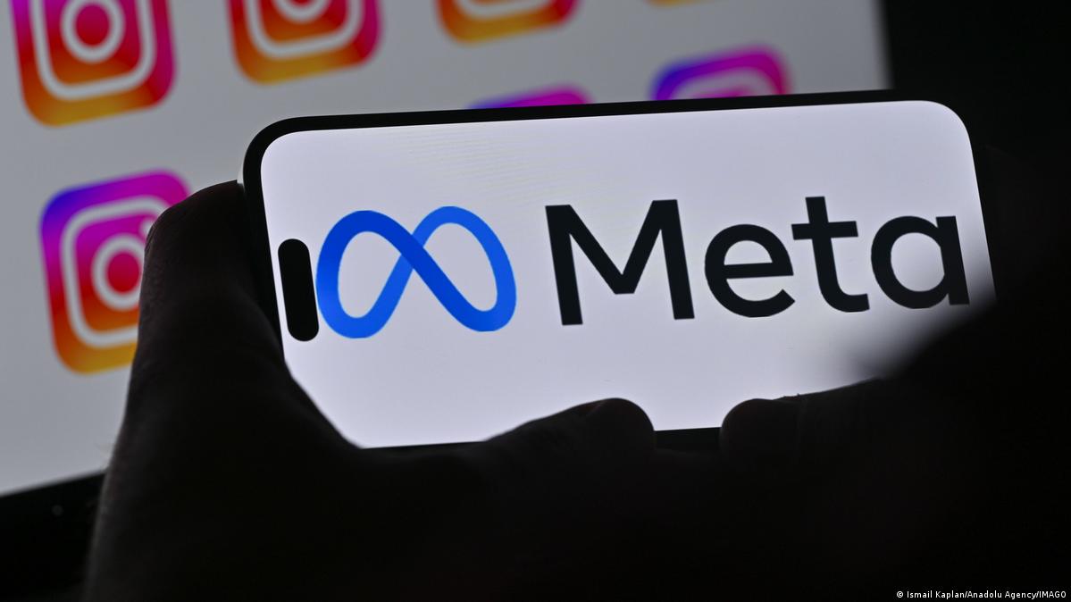 A person holds a phone with the Meta logo across the screen, in Ankara, Turkey, on April 10, 2026