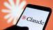 The Claude AI logo is seen on a smartphone screen The Claude AI logo is seen on a smartphone screen