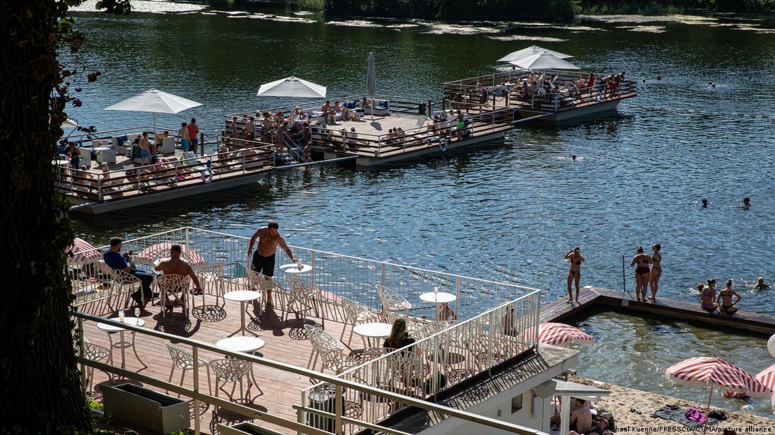 Swimmers on a lake in Berlin Swimmers on a lake in Berlin