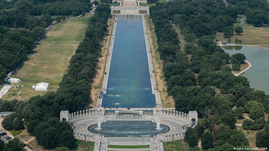 $14.7m "American flag blue" paint peeling off Reflecting Pool, water turned green with algae