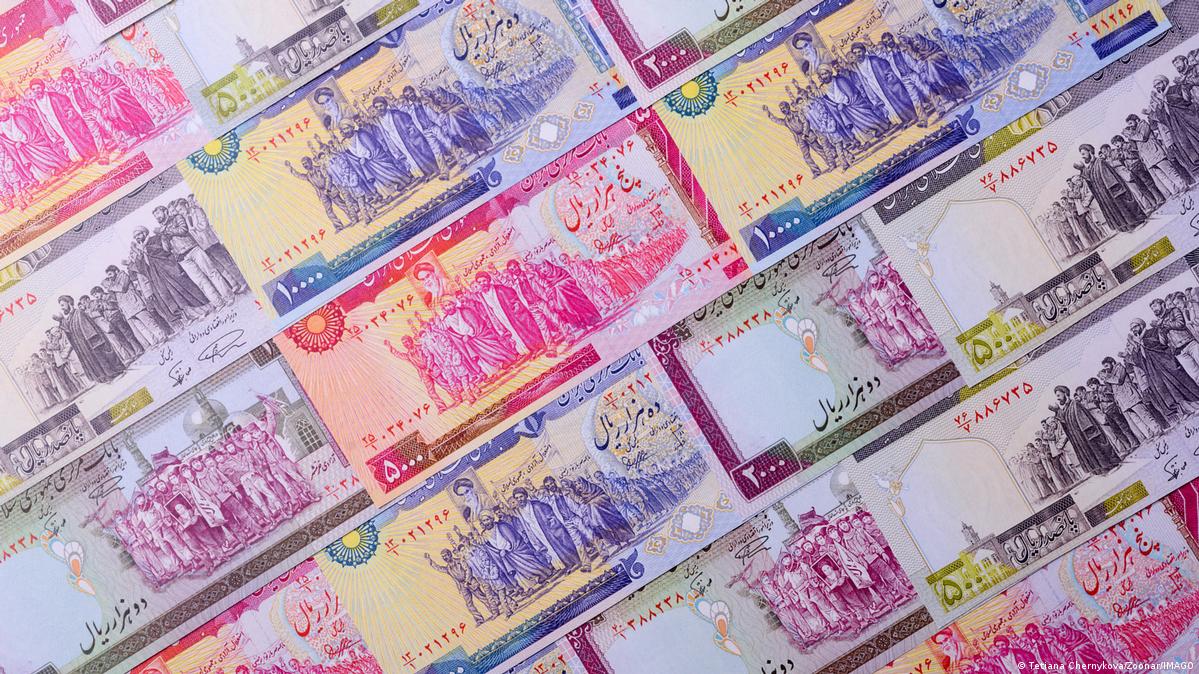 A shot of several Iranian rial notes laid out side by side