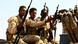 Sudanese soldiers from the Rapid Support Forces unit hold rifles and guns while sitting on a pickup truck Sudanese soldiers from the Rapid Support Forces unit hold rifles and guns while sitting on a pickup truck