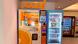 An iJooz vending machine next to locked fridge in Singapore An iJooz vending machine next to locked fridge in Singapore