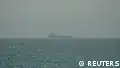Oil tanker struck in Strait of Hormuz, UK says