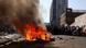 Burning debris seen during an an anti-immigrant demonstration, in Johannesburg Burning debris seen during an an anti-immigrant demonstration, in Johannesburg