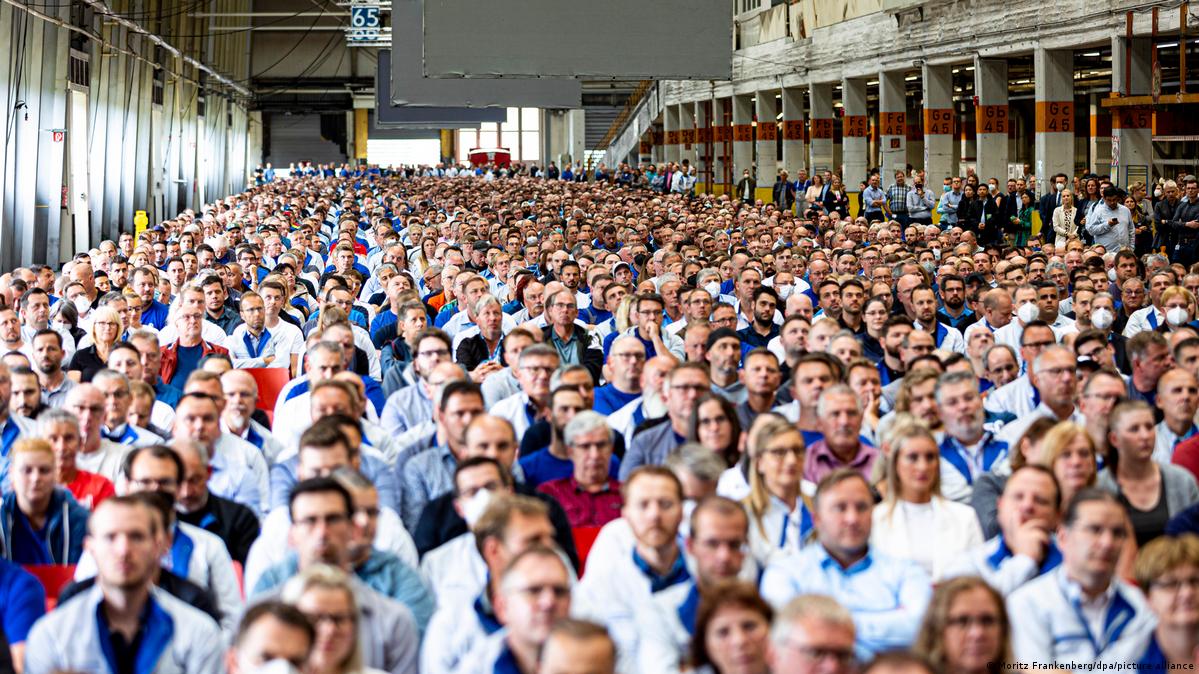 Volkswagen employees attend a staff meeting marking the start of construction on the company's electric vehicle battery cell plant in Salzgitter, Germany, on July 7, 2022