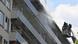 Brand in einem Wohnhaus im Stadtteil Linkeroever in Antwerpen, die Feuerwehr bei Löscharbeiten Brand in einem Wohnhaus im Stadtteil Linkeroever in Antwerpen, die Feuerwehr bei Löscharbeiten
