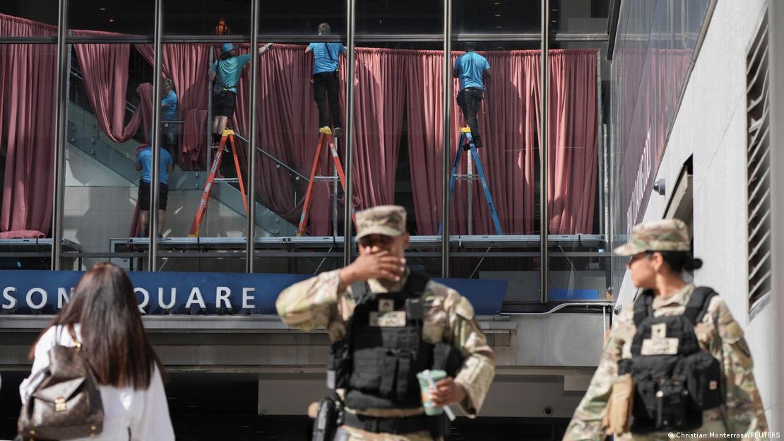 Workers make arrangements inside the Madison Square Garden