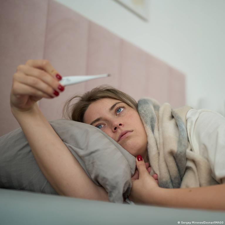 A patient visits a doctor as Germany debates stricter sick-note rules