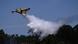 An Italian Canadair plane drops water over a wildfire near the village of Sao Joao do Monte, central Portugal, on July 05, 2026 An Italian Canadair plane drops water over a wildfire near the village of Sao Joao do Monte, central Portugal, on July 05, 2026