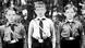 Three young boys in Hitler Youth uniforms.