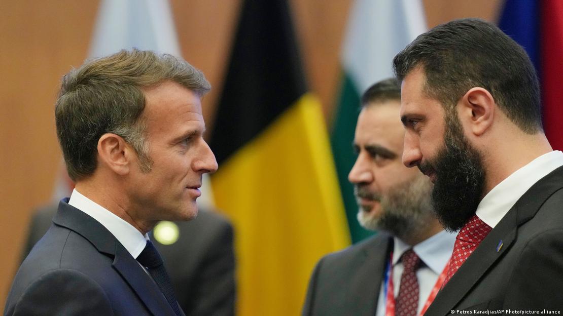 French President Emmanuel Macron, left, talks with the Syrian President Ahmad al-Sharaa during the EU Summit in Nicosia, Cyprus, April 24, 2026. 