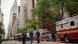 A view of a Manhattan streert and fire fighters on the scene A view of a Manhattan streert and fire fighters on the scene