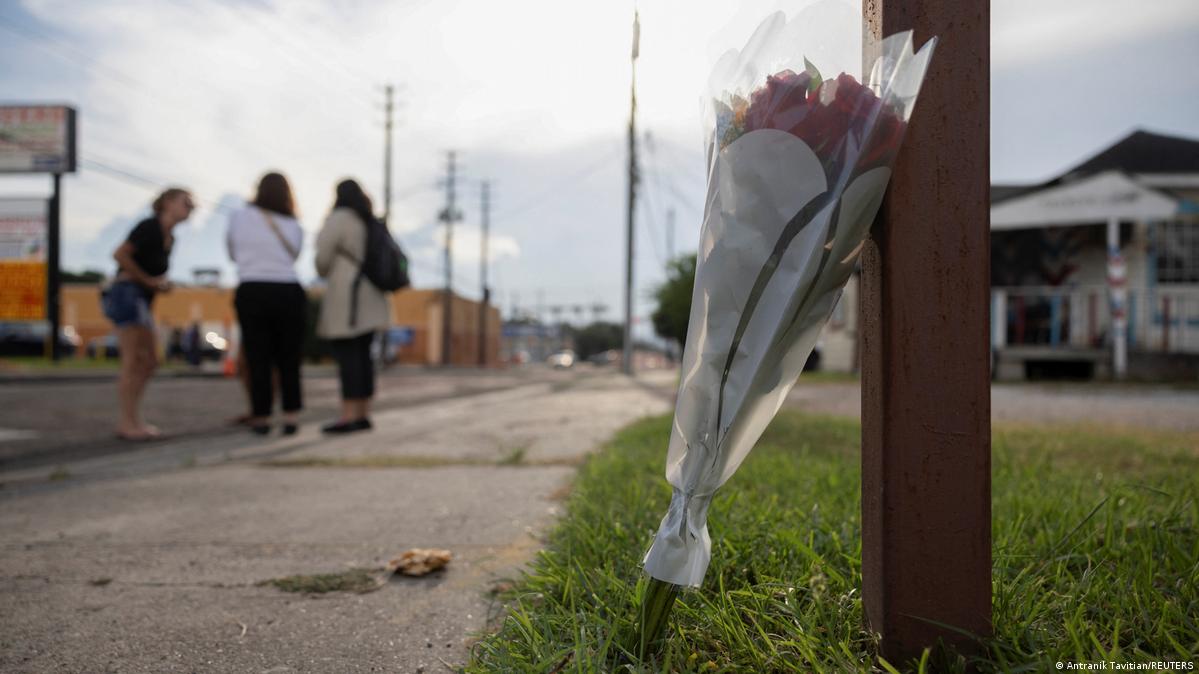 Flowers laid at the site of an ICE-involved shooting in Houston