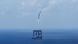 The booster coming in to land at an offshore recovery platform in South China Sea The booster coming in to land at an offshore recovery platform in South China Sea