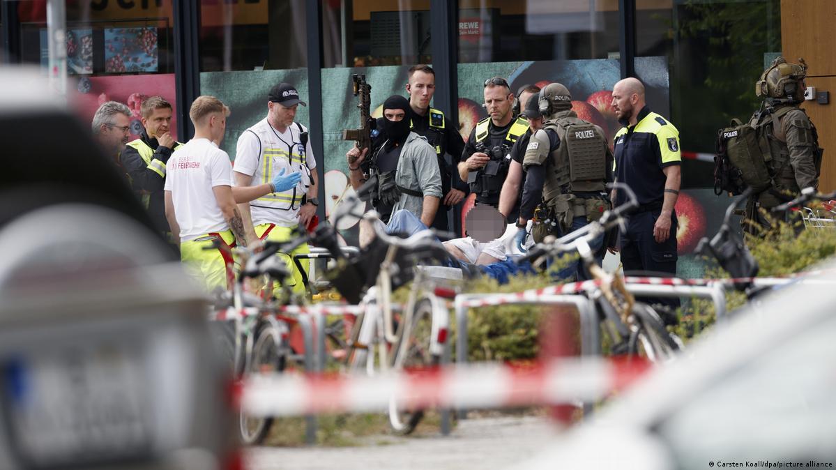 Police outside the supermarket where the operation took place on Saturday morning