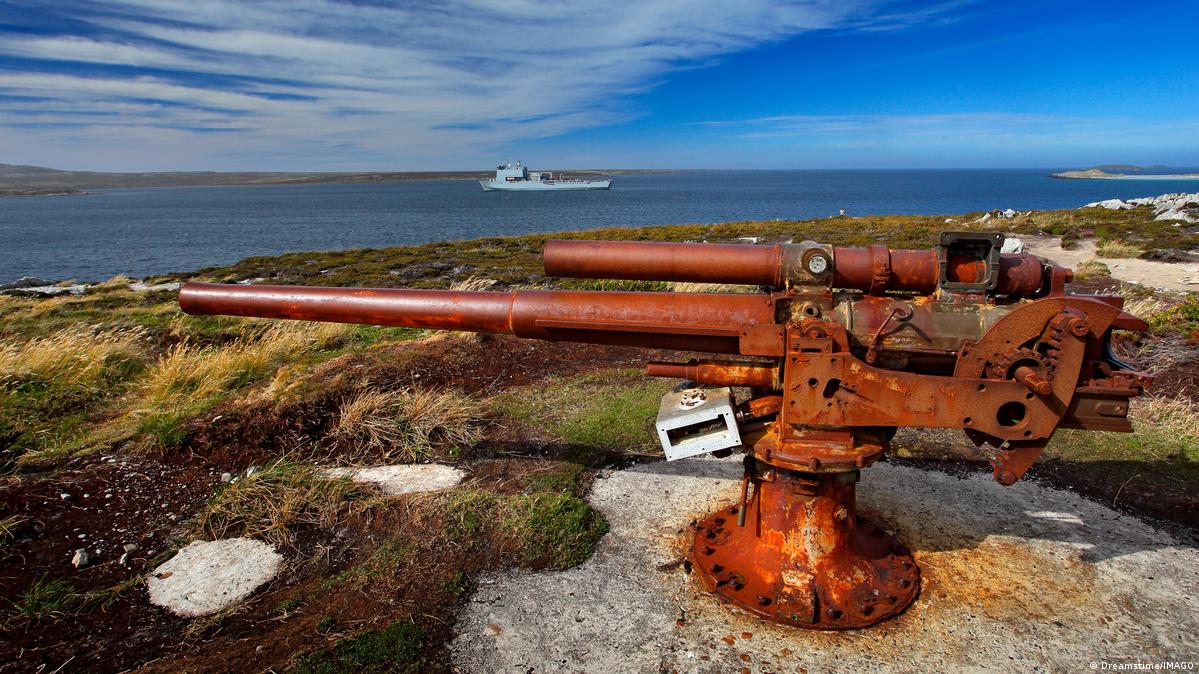 Corroded artillery gun from Falklands Conflict in nature habitat