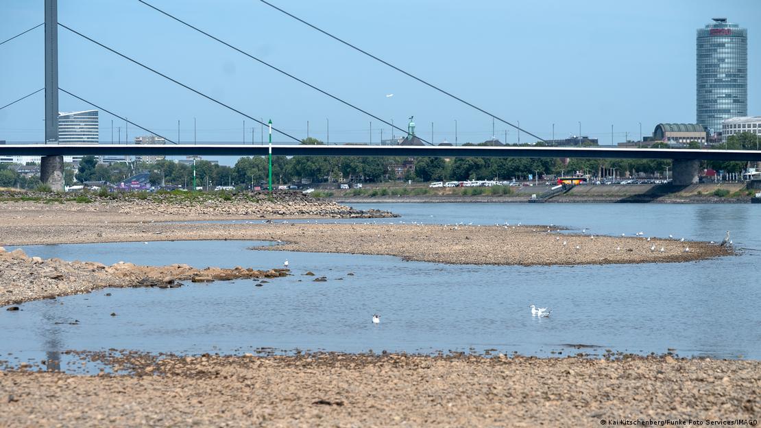 Exposed riverbed on the low-water Rhine near Düsseldorf. Exposed riverbed on the low-water Rhine near Düsseldorf.