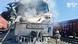 Ukrainian rescuers work to extinguish a fire in a train's locomotive Ukrainian rescuers work to extinguish a fire in a train's locomotive