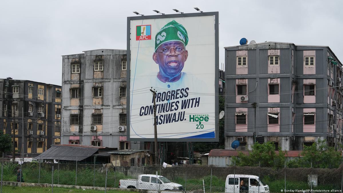 A giant poster of Nigerian President Bola Tinubu displayed on a building
