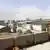 En la imagen tomada de un video se observa una nube de polvo que se levanta durante el terremoto.
