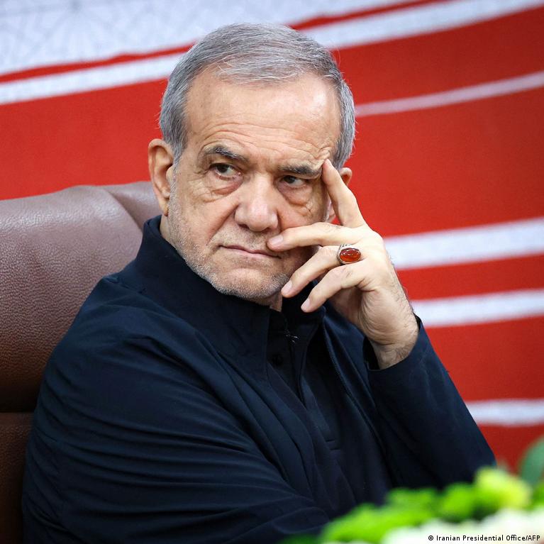 Iran's Pezeshkian defends US deal as best peace option, says 'no capitulation'; SNSC backs MoU as hardline leader threatens retaliation