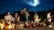 Well wishers gather during a night vigil for King Harald V