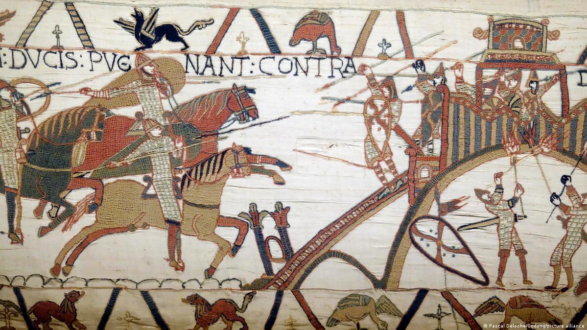 A battle scene from the Bayeux Tapestry — an 11th-century embroidered masterpiece depicting the Norman conquest of England, notably the Battle of Hastings, crafted in wool on linen — pictured on Augus
