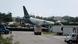 Image 12: An Amazon cargo plane is seen after it crashed at Miami International Airport on September 06, 2026 in Miami, Florida, US