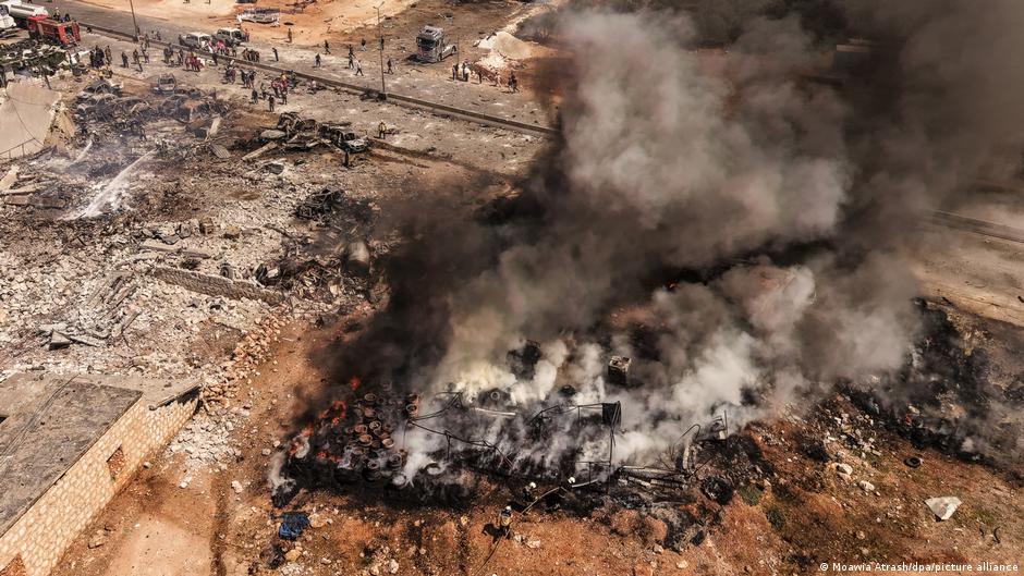 Syria arms depot explosion kills at least 14