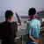 Two North African youths at the Spanish-Moroccan border in Ceuta on August, 14, 2026