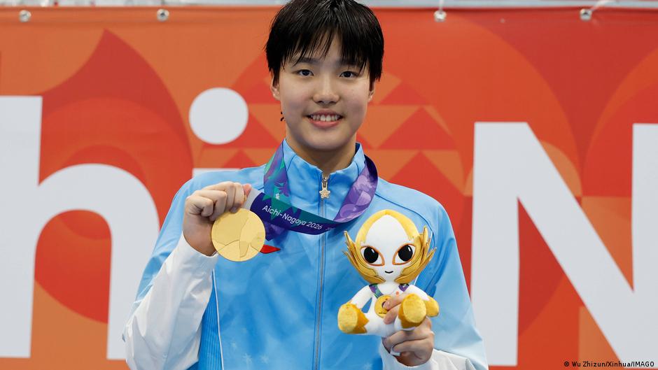 China's 13-year-old swimming star raises questions on child athletes