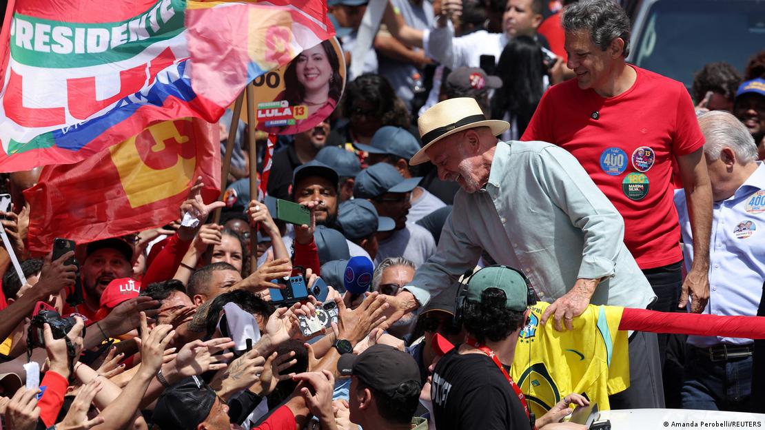 Luiz Inacio Lula da Silva greets supporters in Sao Paulo