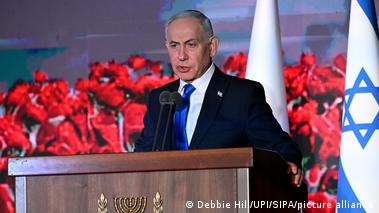 Image 8: Israeli Prime Minister Benjamin Netanyahu speaks at the State Memorial Ceremony for the three-year anniversary of the October 7, 2023, Hamas attack