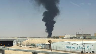Image 10: Large plume of black smoke rises from the fuel storage area at King Khalid International Airport. September 19, 2026.
