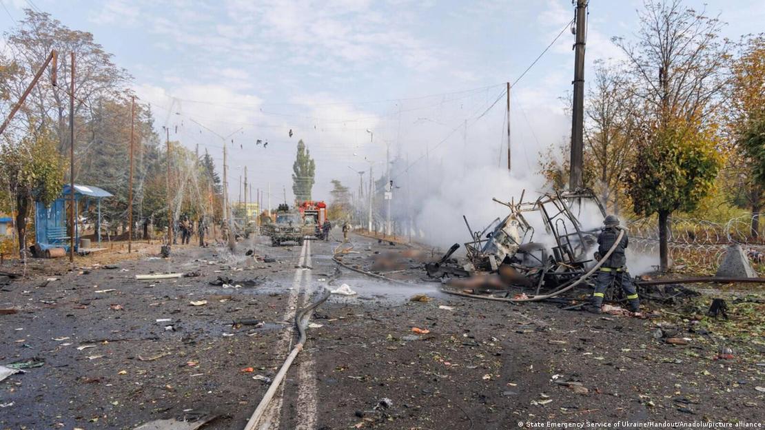 Firefighters perform cooling and search operations on the burnt shell of a passenger bus following a Russian missile and aerial bomb strike in Kramatorsk Firefighters perform cooling and search operations on the burnt shell of a passenger bus following a Russian missile and aerial bomb strike in Kramatorsk
