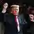President Donald Trump dances as he departs after delivering remarks during a rally at F&M Bank Arena on October 10