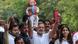 Rahul Gandhi holds up a doll resembling Prime Minister Narendra Modi and a copy of India's constitution Rahul Gandhi holds up a doll resembling Prime Minister Narendra Modi and a copy of India's constitution