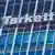 Логотип компании Tarkett на фасаде многоэтажного офисного здания