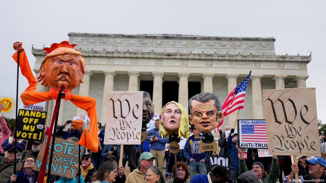 People gather near the Lincoln Memorial during a "No Kings" protest as part of a nationwide day of action aimed at encouraging early voting ahead of the midterm elections, in Washington, DC, US, October 17, 2026