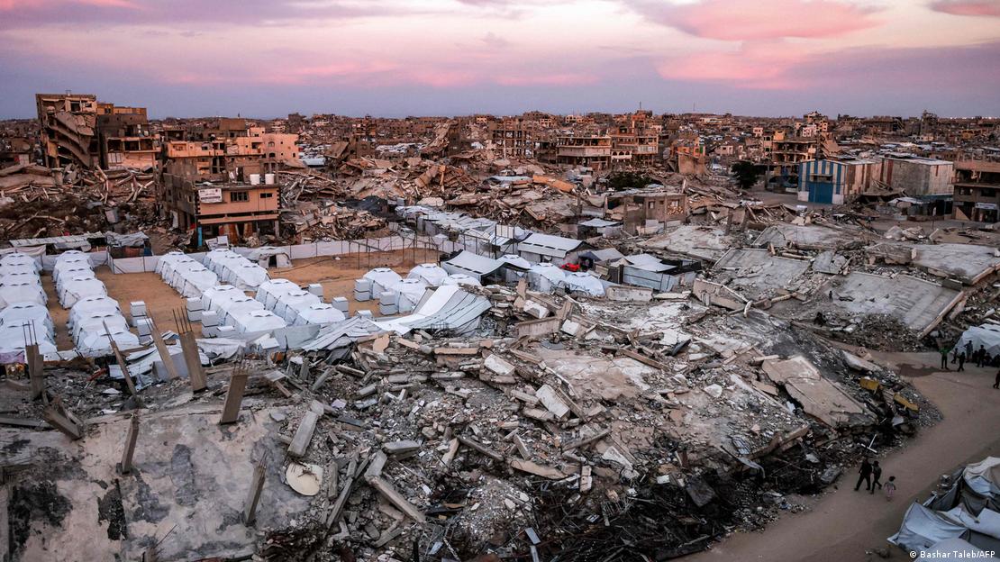 Tents sheltering people displaced by war are pictured between the rubble of destroyed buildings in the Jabalia camp for Palestinian refugees in the northern Gaza Strip.
