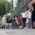 People line up to cast their ballots in Salvador