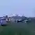 Poprište pada kod Brčkog na kojem se vide vozila hitnih službi i olupina helikoptera