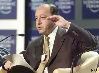 French Finance Minister Laurent Fabius reads his statement at the Davos World Economic Forum in Davos, Switzerland on Saturday, Jan. 27, 2001. Fabius took part in the forum on Steadying the Course of the Global Economy. (AP Photo/Herbert Knosowski)