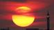 A huge sun over a cityscape A huge sun over a cityscape